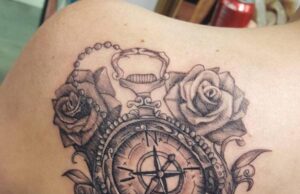 tatuajes de brújula con rosas