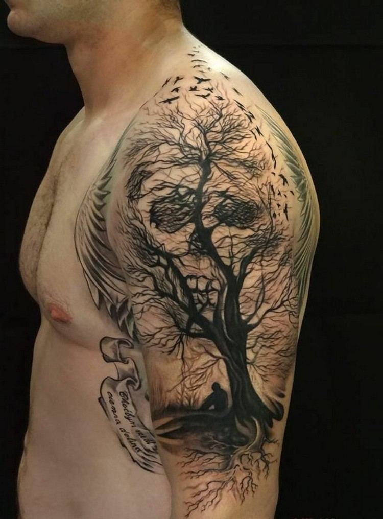 tatuaje idea hombre hombro árbol ramas cráneo