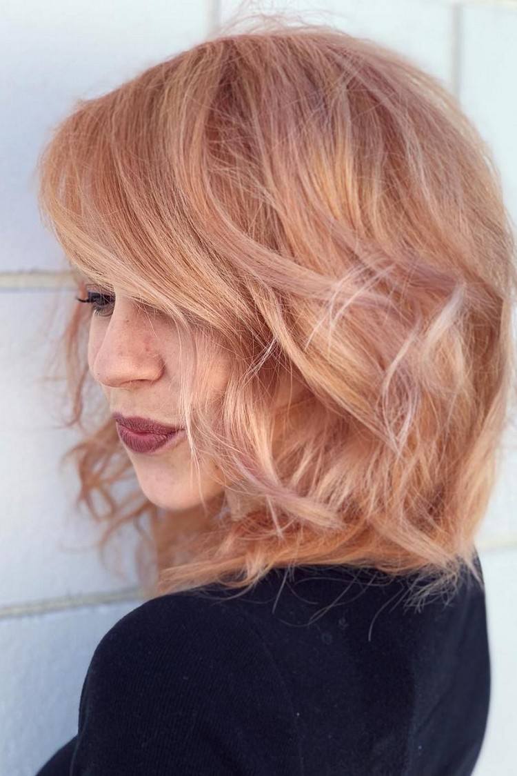 Estilo desorganizado de matiz de cabello rubio fresa durazno
